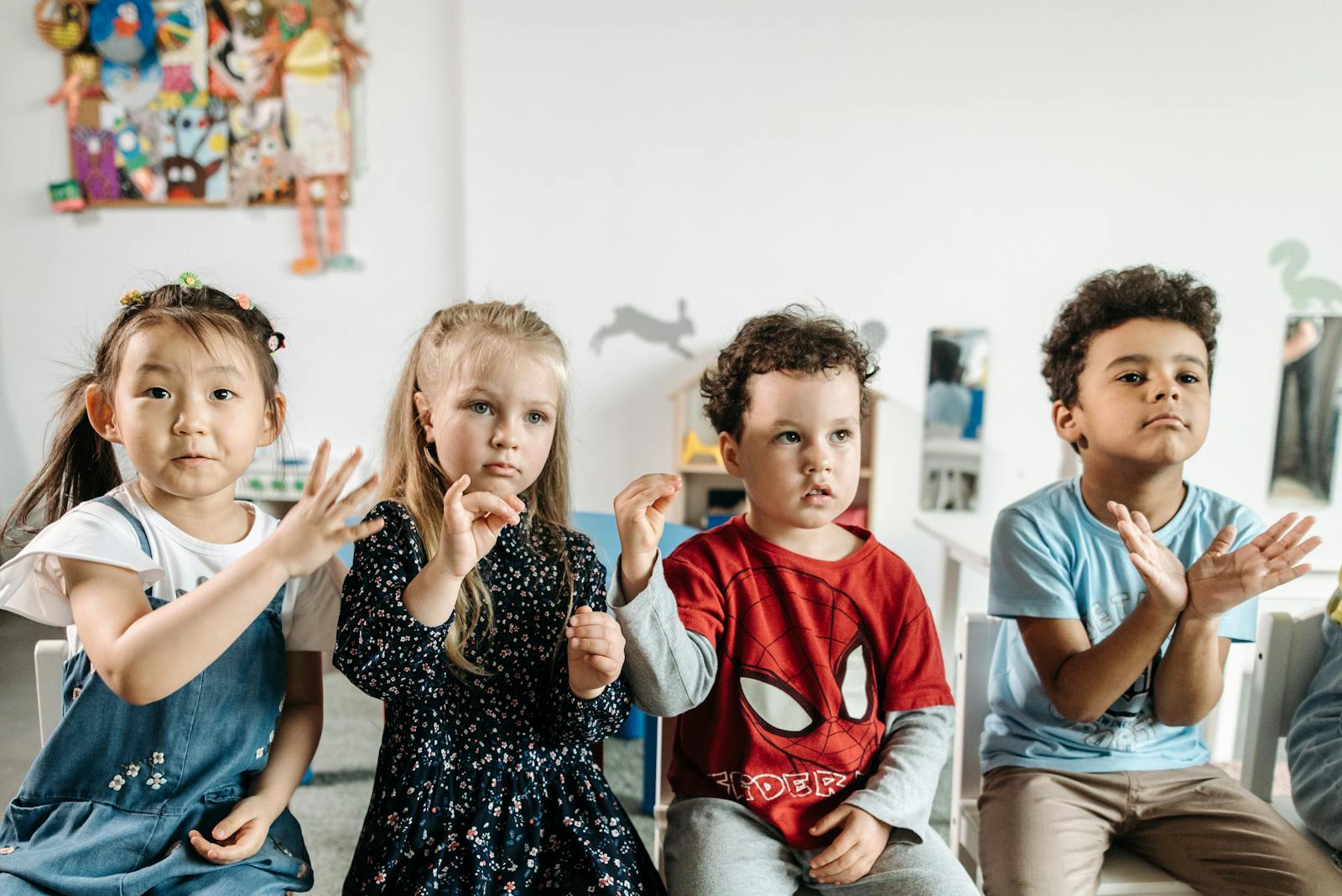 Preschoolers learning together in a bright classroom