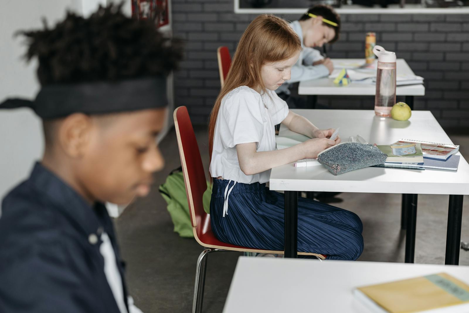 Young children playing and exploring in a classroom